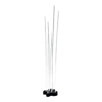 Clear glass sticks on a sleek black base, creating a modern and minimalist design. Suitable for contemporary decor.