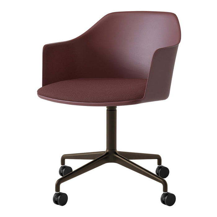 Burgundy upholstered chair with a smooth finish and a sleek, modern base. Ideal for stylish office or home decor.