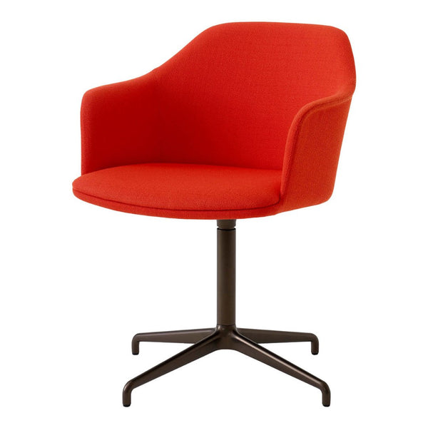 Modern red upholstered chair with a sleek black metal swivel base, featuring a smooth, minimalist design.