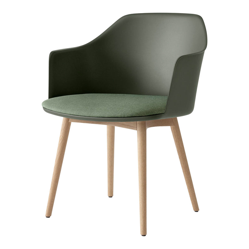 "Modern chair in deep green with a light green cushion and natural wooden legs."