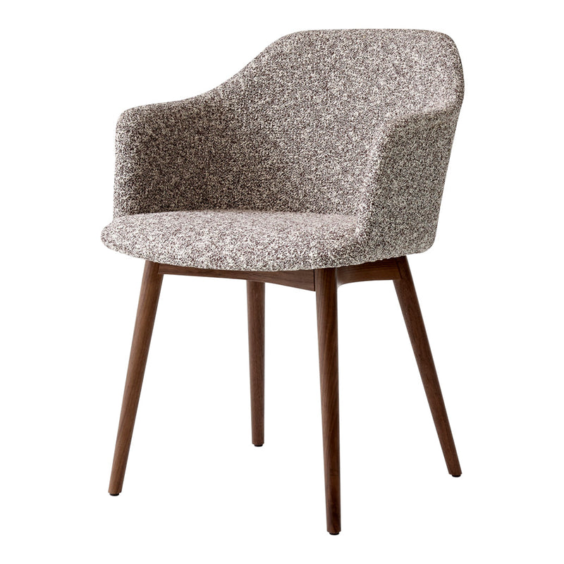 Textured gray and beige patterned upholstery on a modern armchair with wooden legs. Stylish and cozy design.