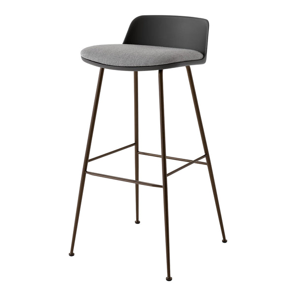 Modern bar stool with a black plastic seat and a gray fabric cushion on sleek brown metal legs.