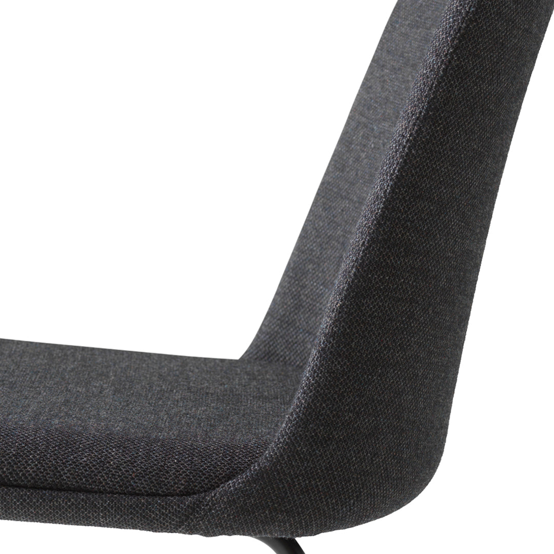 Stylish dark gray chair upholstery with a subtle textured pattern, enhancing modern decor aesthetics.