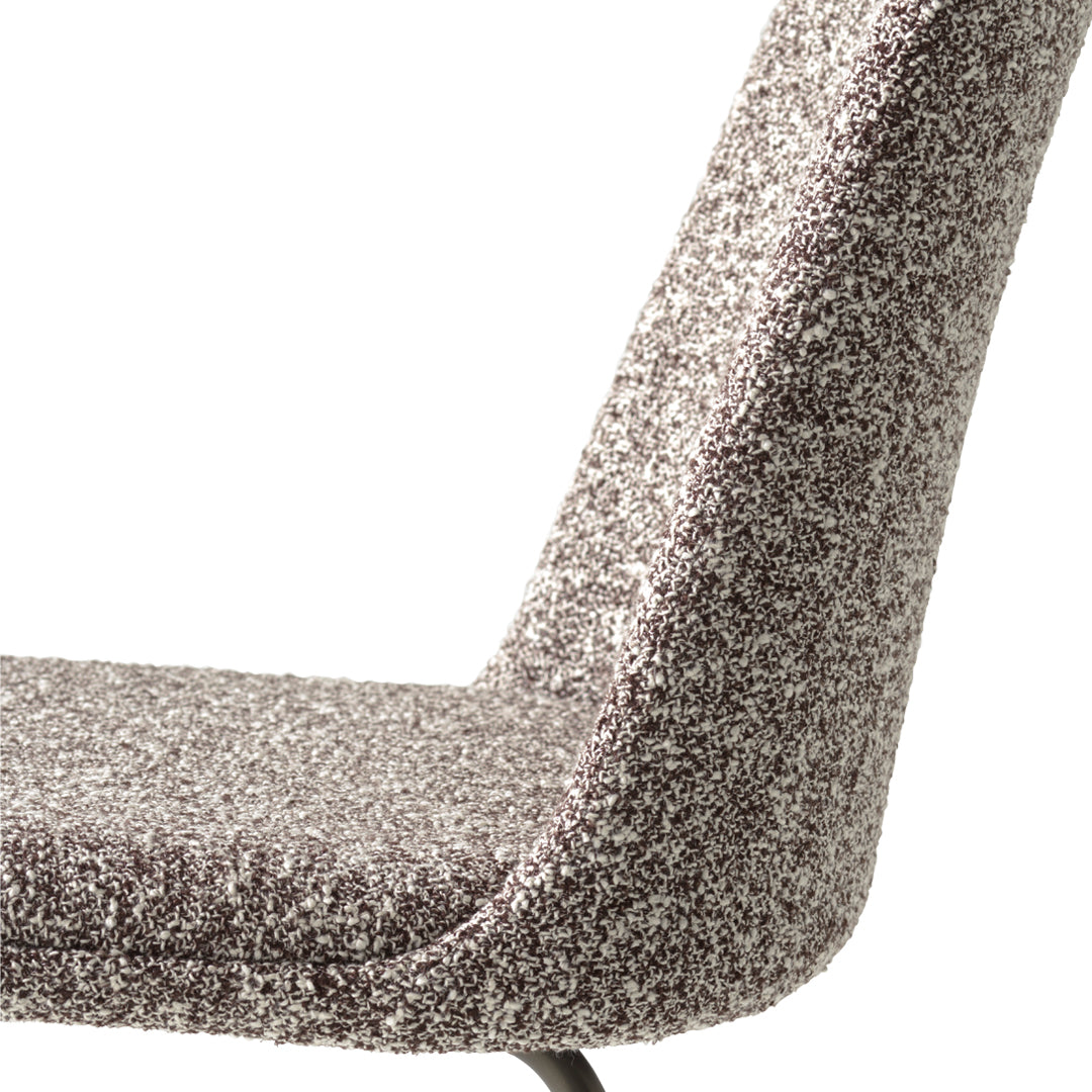 Textured gray and silver fabric chair with a speckled pattern for modern decor.