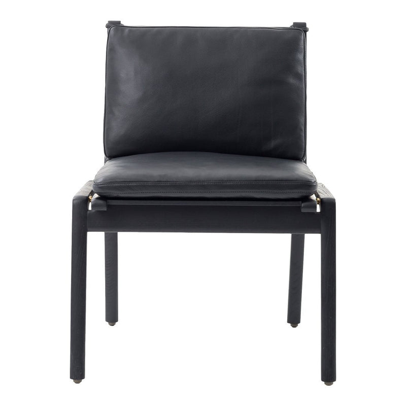 Sleek black leather chair with minimalist design and smooth texture. Modern style for contemporary decor.