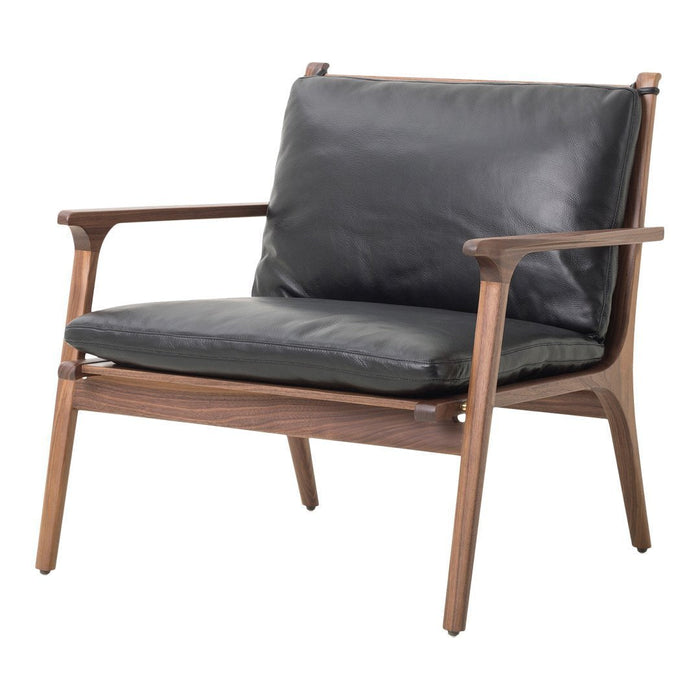 "Modern armchair with a sleek black leather seat and walnut wood frame, showcasing a minimalist design."