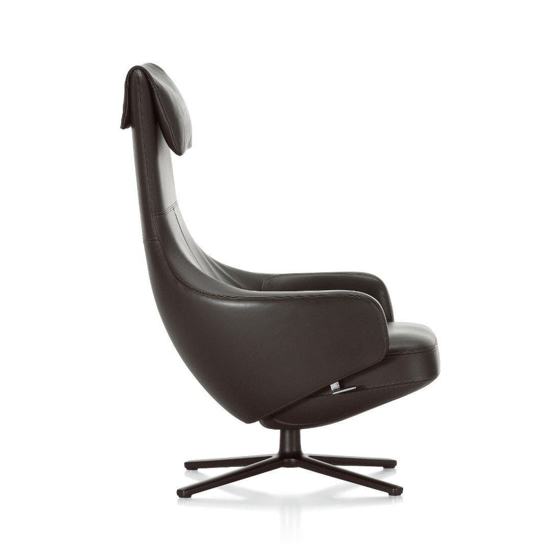 Sleek black leather accent chair featuring a modern design and smooth, curved lines. Perfect for contemporary decor.