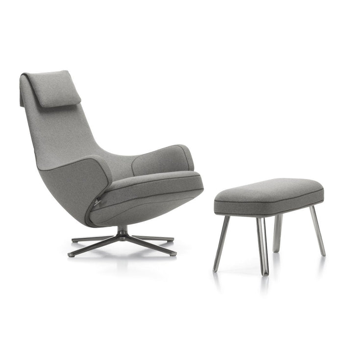Gray upholstered chair with matching ottoman, featuring a sleek, minimalist design and subtle texture.