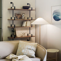 Modern wooden shelf with black metal accents, beige sofa cushion with geometric pattern, soft lighting, and blue wall art.