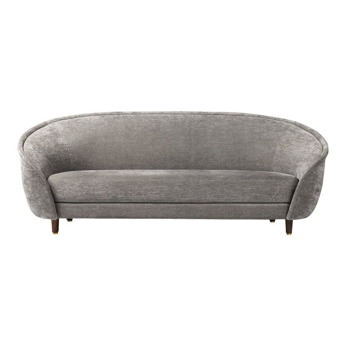 Gray velvet curved sofa with smooth texture and sleek wooden legs, perfect for modern home decor.