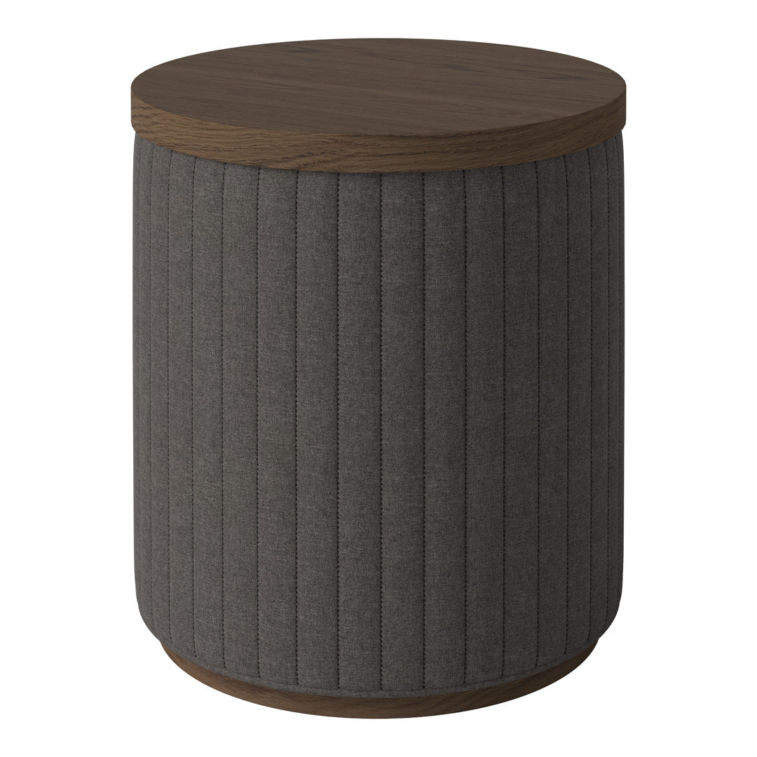 Gray ribbed fabric cylindrical side table with a dark wood top and base. Modern and stylish accent piece.