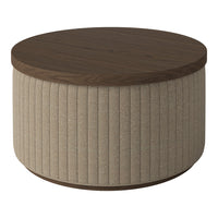 Round coffee table featuring a brown wood top and beige ribbed upholstery for a modern, textured look.