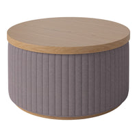 Round coffee table with a light wood top and a textured, soft gray fabric base featuring vertical ribbed patterns.