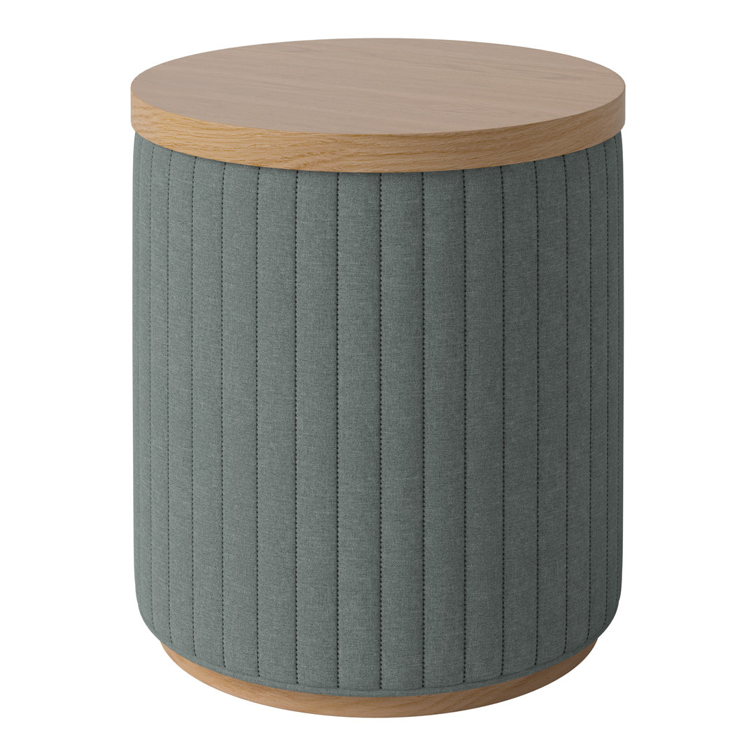 Round accent table with a textured, green fabric base and a light wooden top. Vertical ribbed pattern adds visual interest.