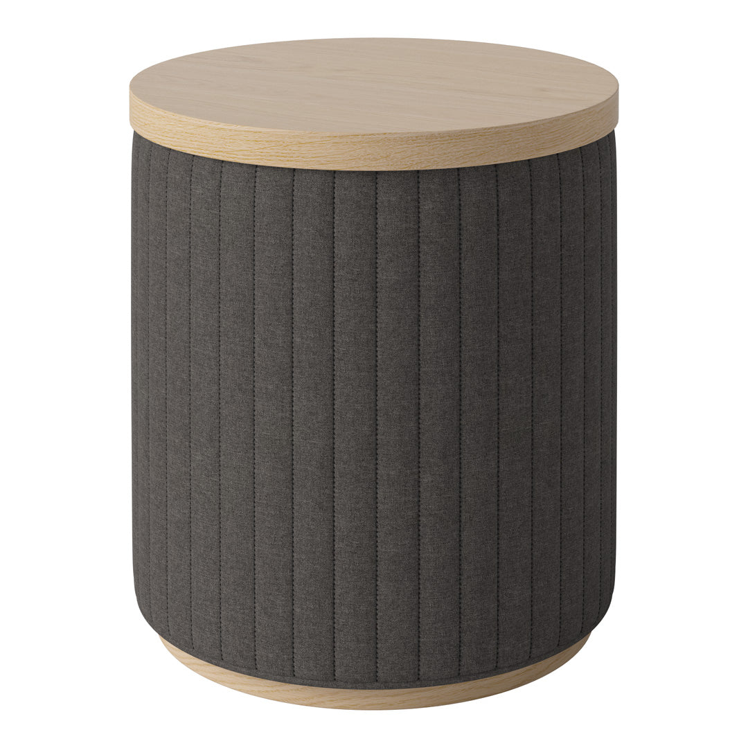 Round side table with a light wood top and dark, ribbed fabric body for a modern, stylish look.