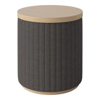 Round side table with a light wood top and dark, ribbed fabric body for a modern, stylish look.