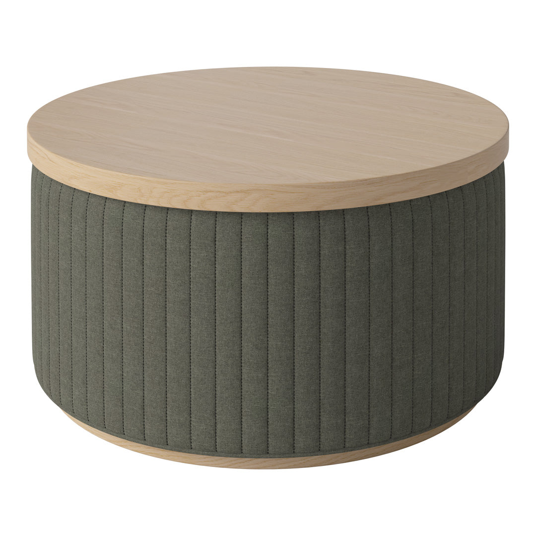 Round coffee table with light wood top and textured olive green fabric base featuring vertical ribbed pattern.