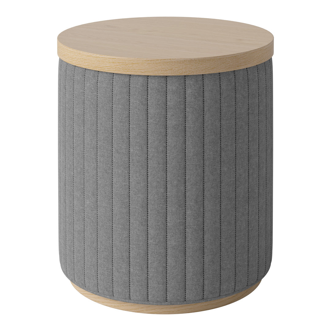 Gray upholstered round stool with vertical ribbed pattern and light wood top. Perfect for modern decor.