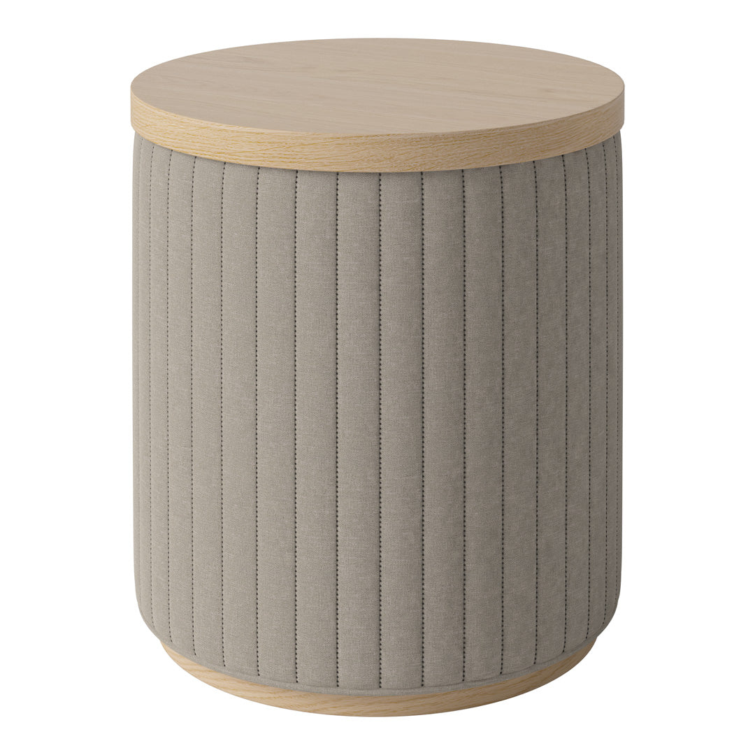 Round accent table with a beige textured fabric body and a light wood top, featuring vertical ribbed pattern.