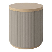 Round accent table with a beige textured fabric body and a light wood top, featuring vertical ribbed pattern.
