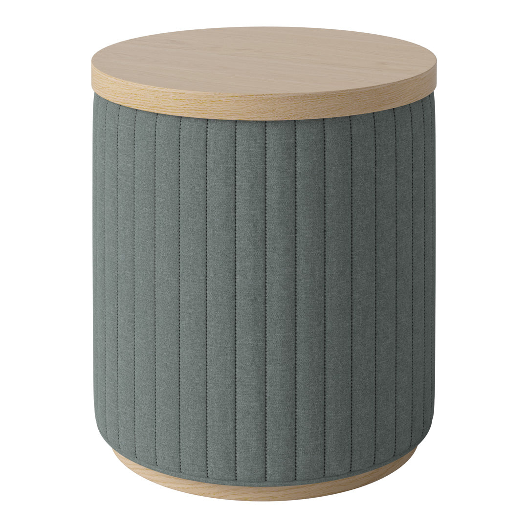 Round side table featuring a textured gray fabric body with vertical ridges and a natural wood top.