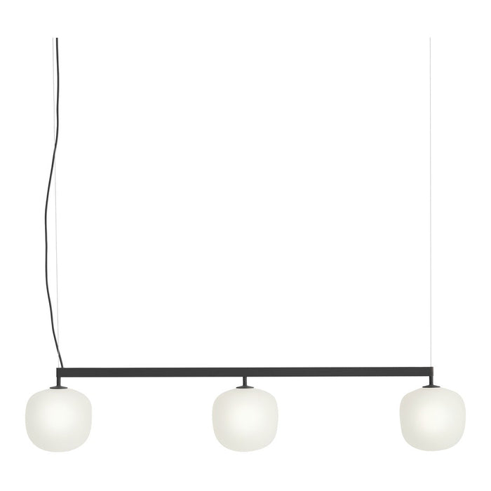 Modern pendant light with three white glass globes and a sleek black frame, perfect for contemporary decor.