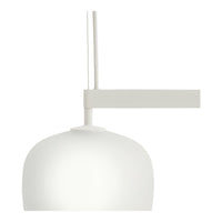 White pendant light with a smooth, rounded shade and a sleek, minimalistic arm in a soft finish.