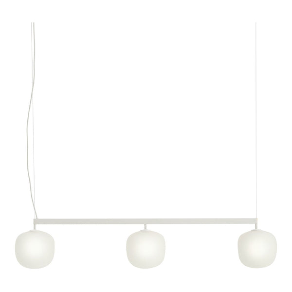 White pendant light with three frosted glass globes and a minimalist design. Ideal for modern decor.