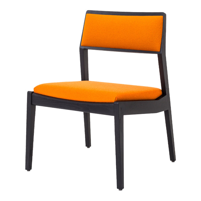 Modern chair with an orange seat and backrest, featuring a sleek black frame for a contemporary look.