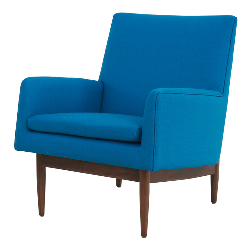 Bright blue fabric armchair with clean lines and wooden legs, perfect for modern home decor.