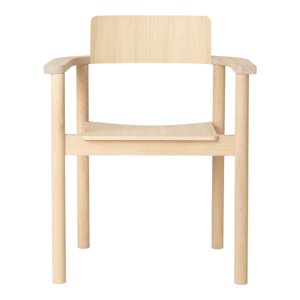 Light natural wood armchair with a simple, minimalist design and smooth, untextured finish.