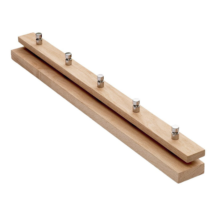 Natural wood coat rack with a smooth finish and five metallic hooks. Simple, modern design ideal for home decor.