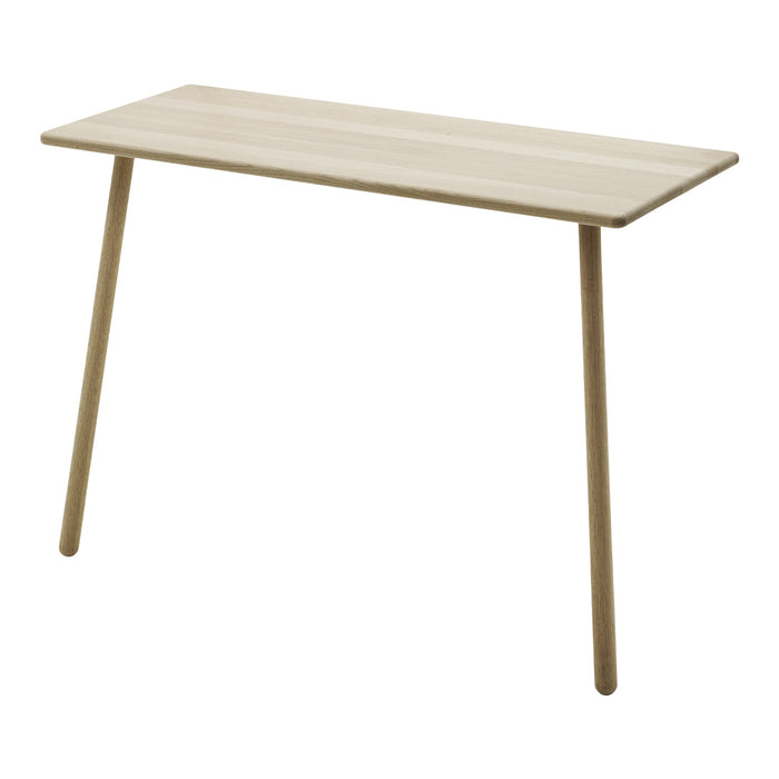 Light wood table with a smooth, natural finish and minimalist design, featuring straight legs and a rectangular top.