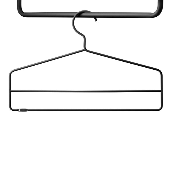 Black metal hanger with a minimalist design and smooth finish. Perfect for organizing your wardrobe efficiently.