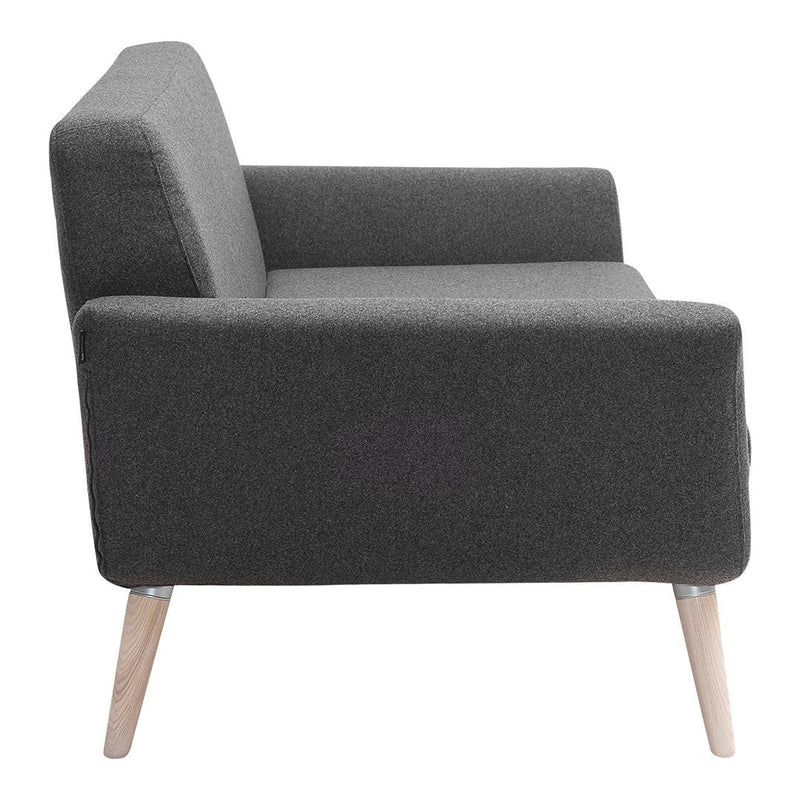 Modern charcoal gray armchair with a textured pattern and light wooden legs, perfect for minimalist decor.