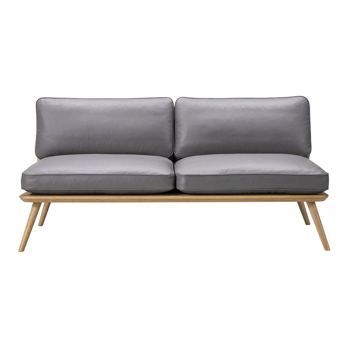Gray leather loveseat with a minimalist design, featuring a solid wood frame and clean lines. Perfect for modern decor.