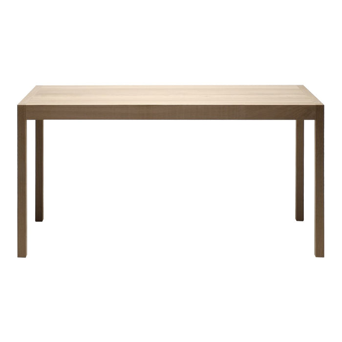 Light wood dining table with a smooth, minimalist design and natural grain pattern. Ideal for modern decor.