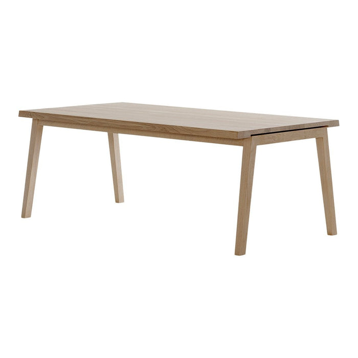 Light wood dining table with a natural finish and sleek, minimalist design. Perfect for modern interiors.