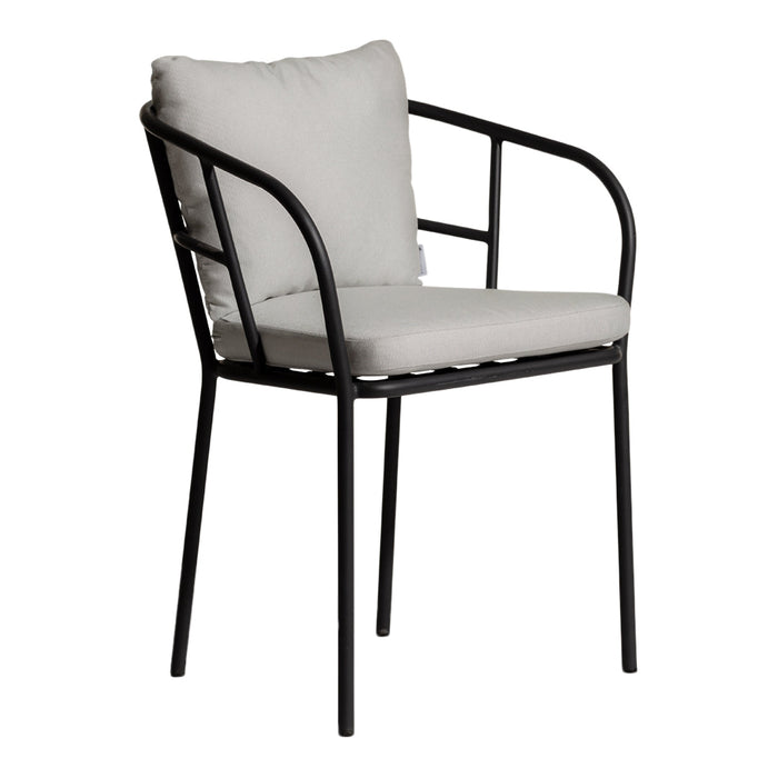 "Modern black metal chair with a light gray cushion, featuring a minimalist design and sleek lines."