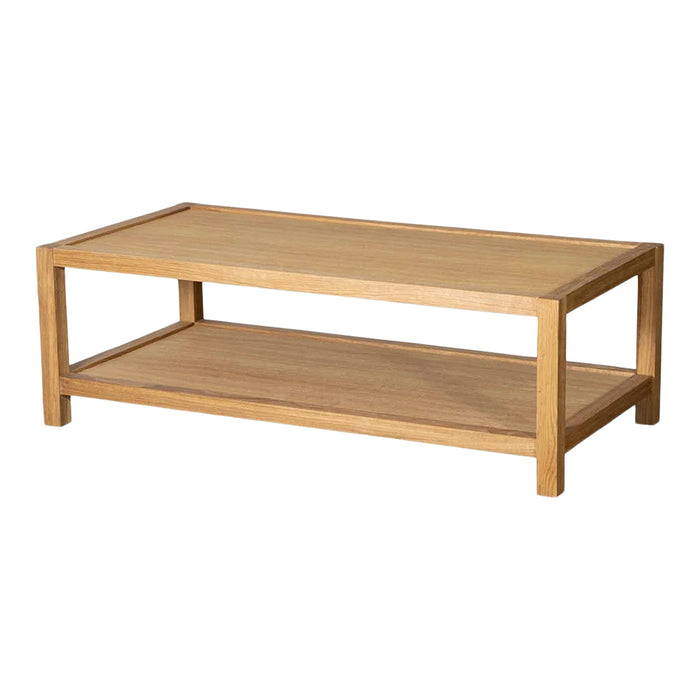 Natural wood coffee table with a light oak finish, featuring a simple, modern design and clean lines.