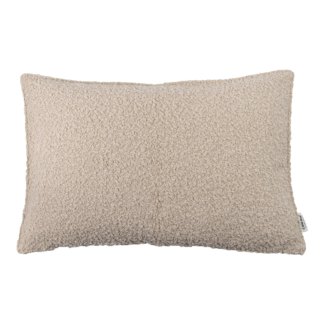Beige textured pillow with a soft, cozy pattern for a warm and inviting home decor accent.