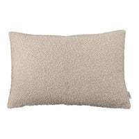 Beige textured pillow with a soft, cozy pattern for a warm and inviting home decor accent.