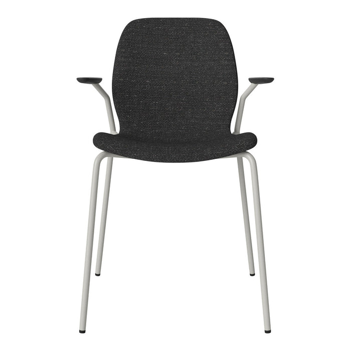 Stylish black fabric chair with a smooth texture and contrasting white metal legs. Perfect for modern decor.