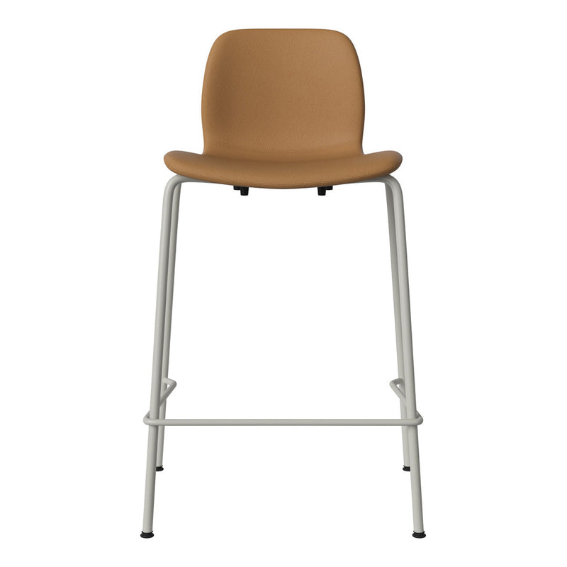 Tan upholstered seat on a sleek silver frame, featuring a minimalist design perfect for modern decor.