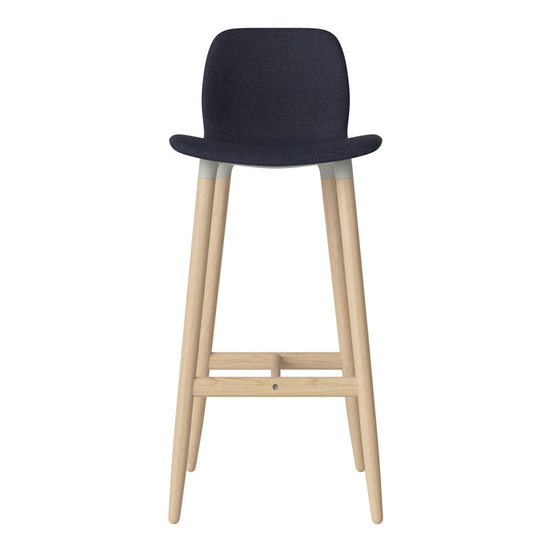 Navy upholstered bar stool with natural wood legs and gray accents, featuring a modern minimalist design.