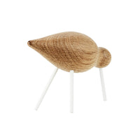 Natural wood finish with smooth grain, complemented by white legs for a minimalist look. Perfect for modern decor.