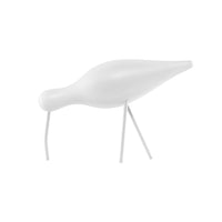 Minimalist white bird figurine with smooth contours and simple design, perfect for modern decor.