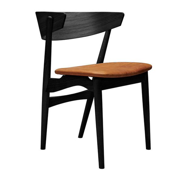 Black wooden chair with a curved back and warm brown seat, showcasing a modern minimalist design.