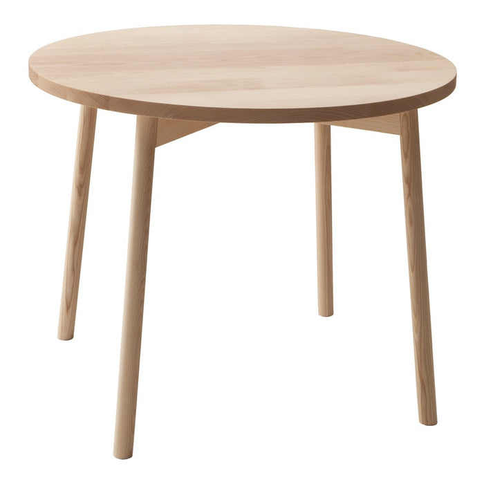 Natural wood round table with light beige finish and minimalist design. Perfect for modern interiors.