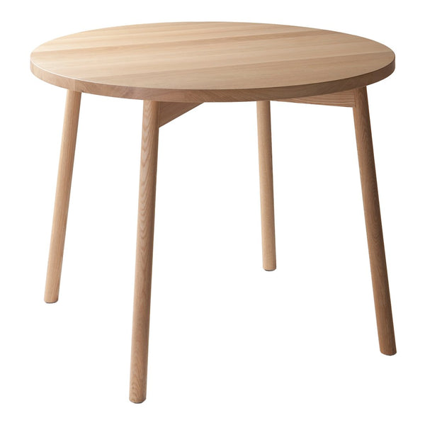 Natural wood round table with a smooth, light wood finish and simple, minimalist design. Perfect for modern decor.